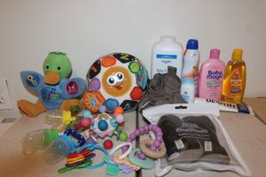 lot 40 image: InfantToddler Toys and Teethers, Bath Products, Shoes and Sunscreen
