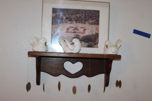 lot 49 image: Small Wooden Shelf with Stretched Pennies, Ceramic Birds and Print