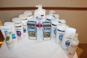 lot 26 image: Several Bottles of Pantene Shampoo 2-in-1, Shampoo, Conditioner Most Full or almost Full, T-Gel Shampoo, Head & Shoulders Shampoo and Biolage Conditioner