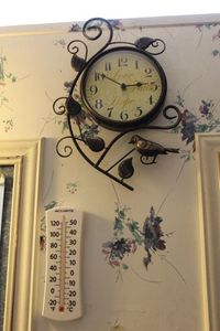 lot 62 image: Clock and Thermometer