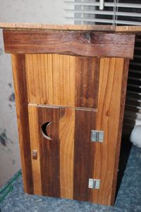 lot 11 image: Wooden Outhousetoilet paper holder approx 9x7x16