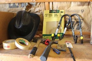 lot 152 image: Tools, Tape, and Cowboy Hat