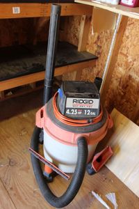 lot 12 image: Rigid 12 Gallon Shop Vac with Attachments