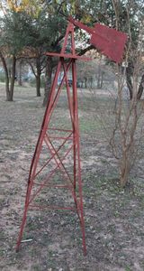 lot 196 image: Red Windmill Tower and Tail Piece (WILL NEED PULLEDDUG UP BRING TOOLS AND HELP)