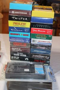 lot 114 image: VHS Tapes and Tape Rewinder