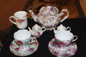 lot 121 image: Rose Themed Tea Pot, Two Cups with Saucers from Victorias Tea Room, Miniture Tea Pots and More