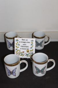 lot 147 image: Butterfly coffee Cups and Painted Tile