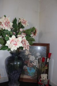 lot 145 image: Large Purple Glass Vase with Roses, Framed Painting, Clear Glass Vase with Valentine Bear and Roses