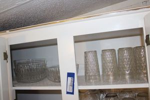lot 238 image: Nine Clear Ice Tea Glasses and Clear Glass Serving Bowls