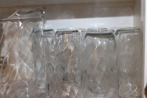 lot 239 image: Clear Glass Tea Pitcher and Glasses