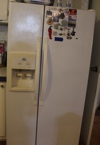lot 275 image: Whirlpool Side By Side Regfridarator with Filtered ice and Water in the Door, Extra Fliter and Freezer Cleaner