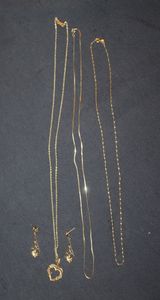 lot 16 image: Three 14kt Gold Necklaces, One with Heart shaped Pendant and Earrings, all Marked 14kt&nbsp