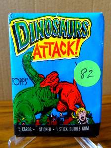 lot 82 image: 1988 Topps Dinosaurs Attack Cards, 1 Sealed Wax PACK From Box, 5 Cards 1 Sticker