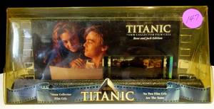 lot 147 image: BIG $ ITEM - NO TWO ALIKE - Titanic Original Hand Cut 70mm Film Cell Rose and Jack Edition 1998 2 Sided (CHECK COMPS)