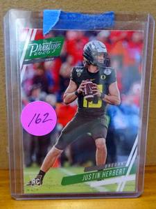 lot 162 image: HOT ROOKIE - Justin Herbert 2020 Chronicles DP Prestige Rookie RC #4 DUCKS  LA CHARGERS