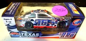 lot 254 image: LIMITED EDITION - TEXAS MOTOR SPEEDWAY #15 TEXAS FALL PROGRAM CAR 164 SCALE