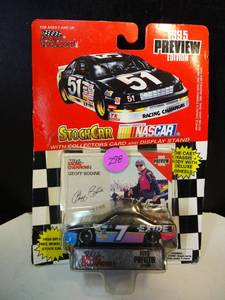 lot 298 image: RACING CHAMPIONS 1995 PREVIEW EDITION - GEOFF BODINE #7 COLLECTORS CARD AND DIECAST WITH STAND
