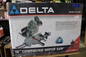 lot 1 image: Delta 10 MITRE saw still in packaging. Model 36-220