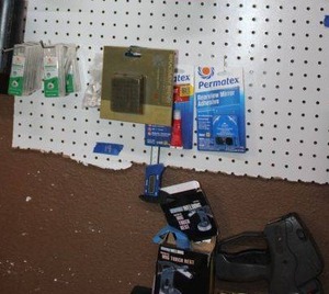 lot 14 image: Misc. lot Welding torch rest, Ryobi countersink bits, door stoppers, hole saw bits