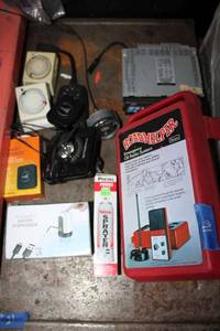 lot 16 image: Misc. lot CB radio system, water dispenser, Alpine car stereo CDA-9847, Smart garage door sensors, and light timers