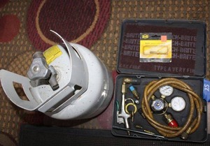 lot 25 image: Gas cylinder small tank and AC fill Gauge set