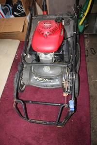lot 36 image: Honda lawn mower model HRB216HXA