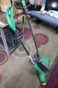 lot 37 image: Twist n edge weed eater and heavy duty electric edger