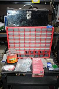 lot 26 image: Tool box and hardware organizer plus drill bit set, hardware and nails