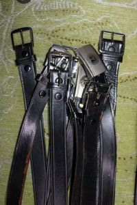 lot 101 image: Leather belts, Black genuine leather. Some marked Genuine Leather Government Cert