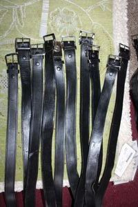 lot 73 image: Black leather belts, 9 total, up to 43 Approx. Some marked Genuine Leather Government Cert