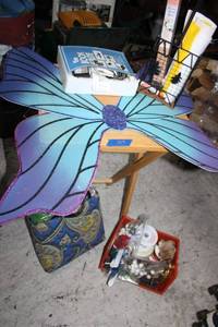 lot 104 image: Craft items, butterfly wings, book light, knitting needles, and more