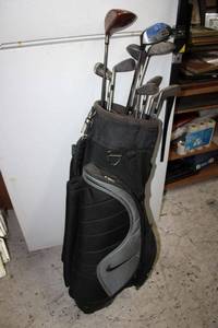 lot 107 image: Golf club and black Nike bag set