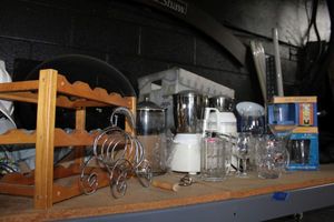 lot 118 image: Drinking glasses, wine racks, beer glasses and super mixer grinder