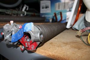 lot 122 image: Pair of garage door torsion springs