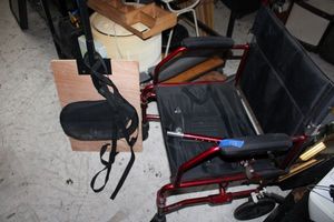 lot 151 image: Red mobility chair with bed rail