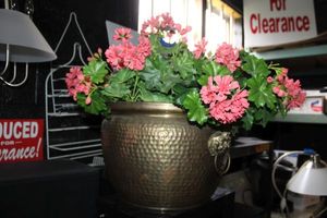 lot 187 image: Hammered brass flower pot