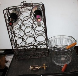 lot 219 image: Metal wine rack with clear glass ice bucket plus bottle openers