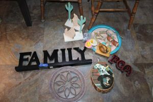 lot 261 image: Home dcor Wood Family sign, Firemans hat photo, Football curtain tie backs and more