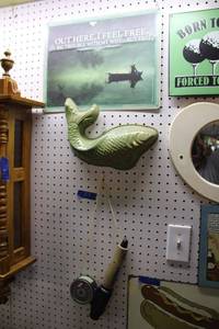 lot 273 image: Fishing and golf metal signs, plastic fish mold, and Fly fishing game