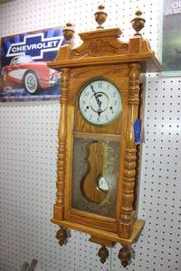 lot 253 image: R&A  pendulum wall mount clock