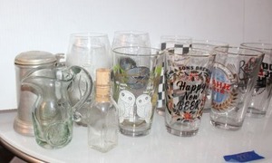 lot 278 image: Beer glasses, Dallas Cowboys glasses, and small glass pitcher