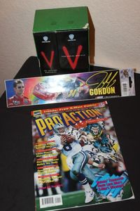 lot 58 image: V VHS Tapes, Jeff Gordon Bumper Sticker and Pro Action Magazine