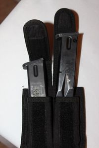 lot 81 image: Two 9 MM Clips with Double Clip Holder