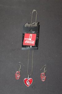 lot 112 image: OU Earrings and Necklace with Coke Pin