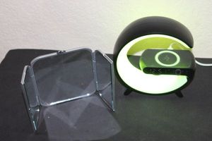 lot 136 image: Combination, Light, Charger, Clock, and Speaker all in One, also Three way mirror