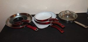 lot 155 image: Variety Of Skillets in Different Sizes , mostly all Red In Color