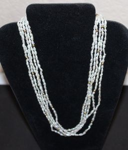 lot 4 image: Multi Strand Rice Pearl Necklace with clasp marked 14K