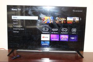 lot 1 image: Roku 65 Smart TV