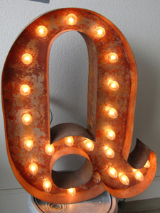 lot 10 image: Illuminated over size letter Q, approx. 25 tall