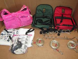 lot 20 image: Outward Hound pet gear dog car seats, dog carriers, leash spikes with long leashes